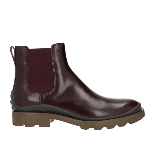 Tod's Stivaletti Chelsea in pelle lucida nera, unione di eleganza e comfort quotidiano.