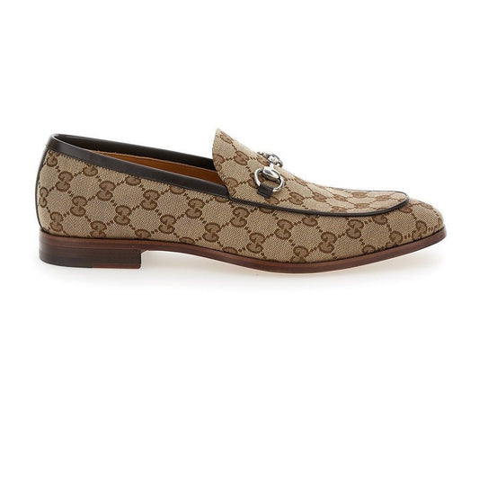Mocassini Gucci eleganti 890G3D00Z100 in beige ed ebano, dettagli raffinati e punta tonda.