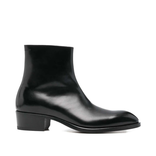 Tom Ford Stivaletti in Pelle di Vitello Nera, stivaletti neri con tacco basso e design a punta.