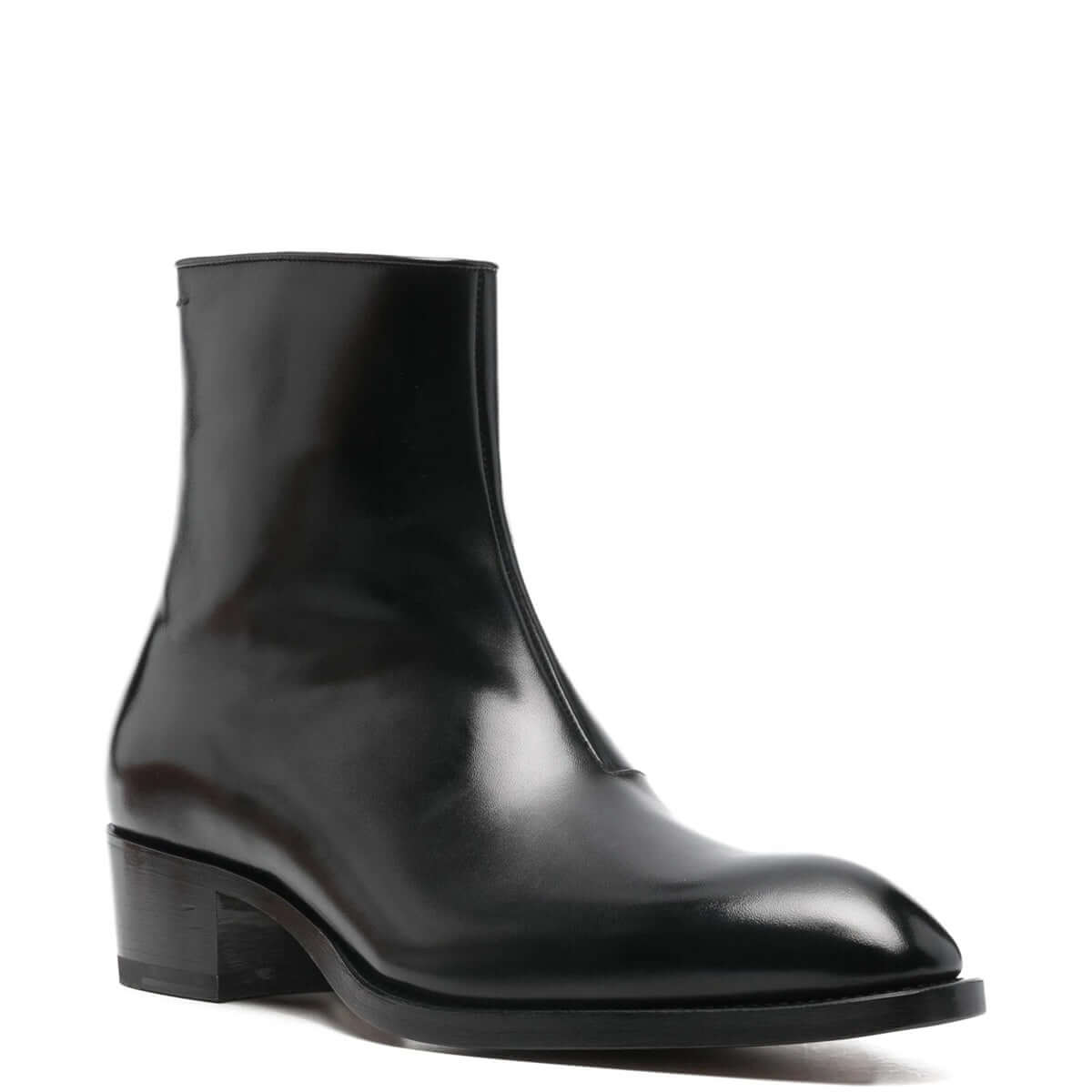 Tom Ford Stivaletti in Pelle di Vitello Nera, stivaletti neri con tacco basso e design a punta.