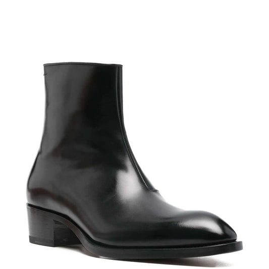 Tom Ford Stivaletti in Pelle di Vitello Nera, stivaletti neri con tacco basso e design a punta.