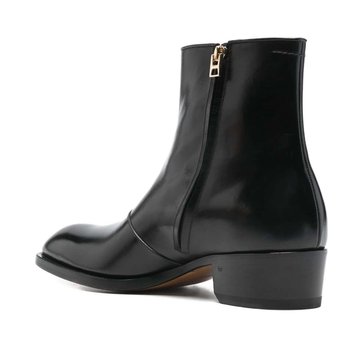 Tom Ford Stivaletti in Pelle di Vitello Nera, stivaletti neri con tacco basso e design a punta.