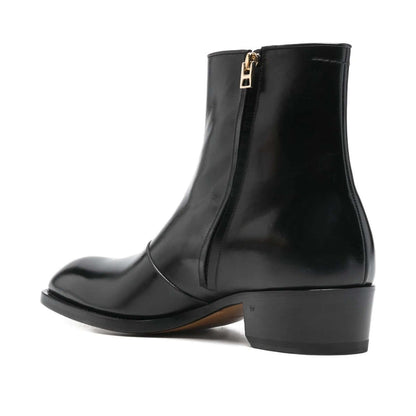 Tom Ford Stivaletti in Pelle di Vitello Nera, stivaletti neri con tacco basso e design a punta.