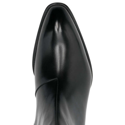 Tom Ford Stivaletti in Pelle di Vitello Nera, stivaletti neri con tacco basso e design a punta.