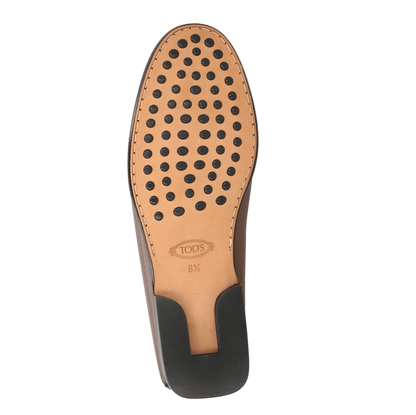 Tod's mocassini da uomo in pelle con dettagli in oro, car shoes artigianali made in Italy.