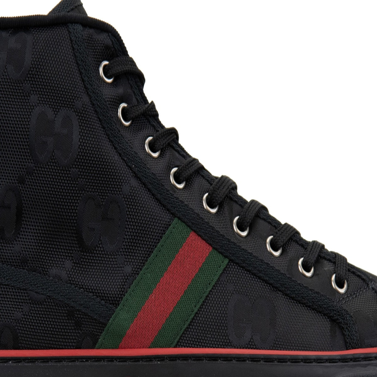 Gucci Sneakers alte Firmate con Motivo GG, alte sneakers nere con motivo logo GG e bande bicolore laterali.
