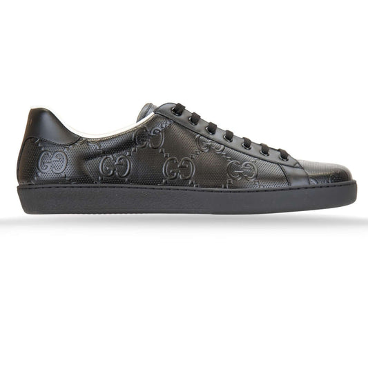 Gucci Sneakers da Uomo in Pelle con Motivo GG in Rilievo, pelli nere con logo GG, design elegante e di lusso.