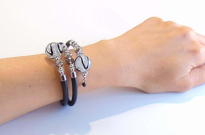 Bracciale donna perle Murano 70M40Z02N200 in vera pelle Toscana con elementi decorativi eleganti.