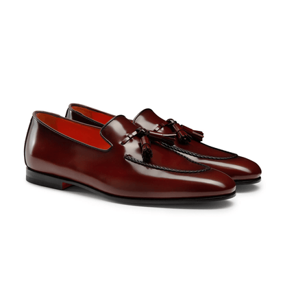 Mocassini in pelle rosso Made in Italy 750S3N02T100 con nappine e costruzione Goodyear flessibile.