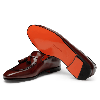 Mocassini in pelle nera Made in Italy 750S3N02T100 con dettagli in frange e suola flessibile.
